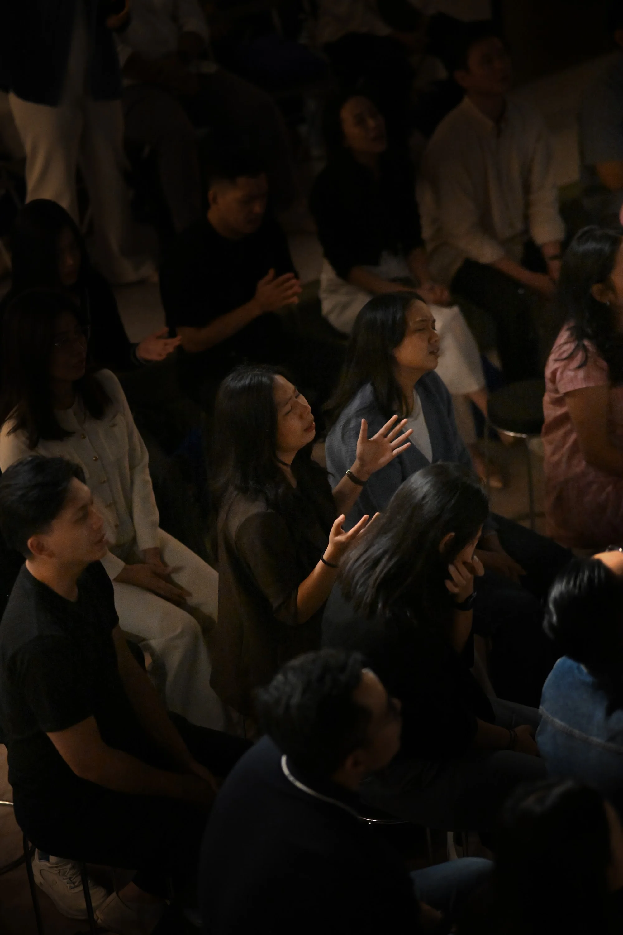People worship with open hands during City Soul Vol. 3