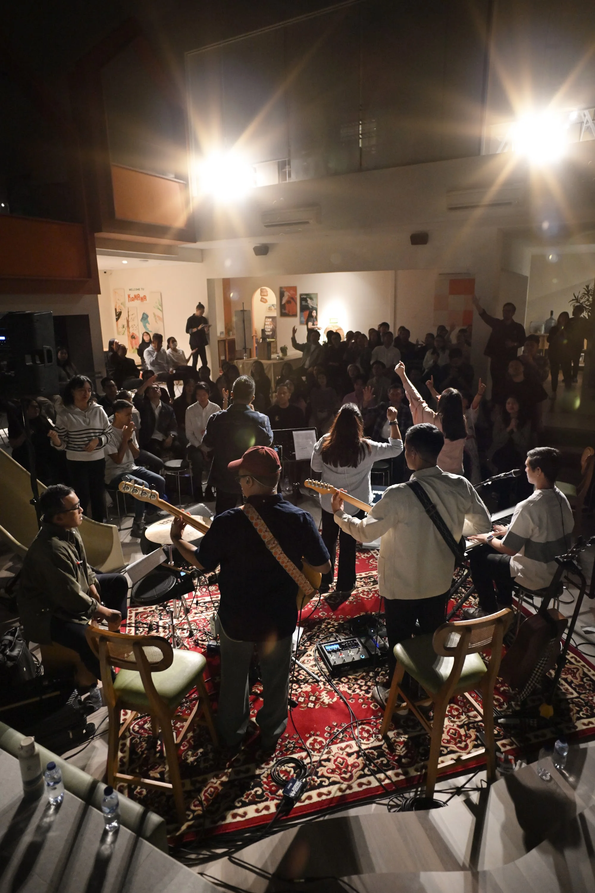 The City Soul worship band plays as the gathered community sings with raised hands